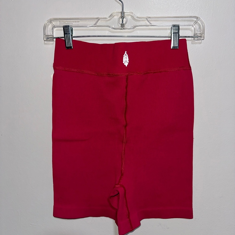NWT Free People High Rise Ribbed Bikers in the color “Passion Fruit”